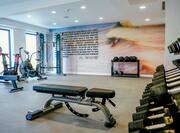 Fitness center with bench and weights