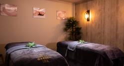 Spa treatment tables with plant