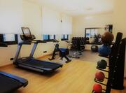 Fitness center with cardio machines and weights