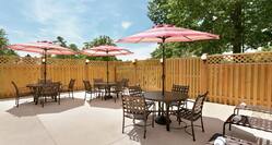 Outdoor Patio Area with Tables, Chairs and Umbrellas