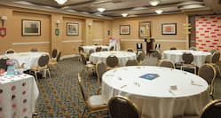 Embassy Suites Meeting Space with Round Tables and Chairs