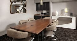 Presidential Suite Meeting Table with Chairs and Room Technology