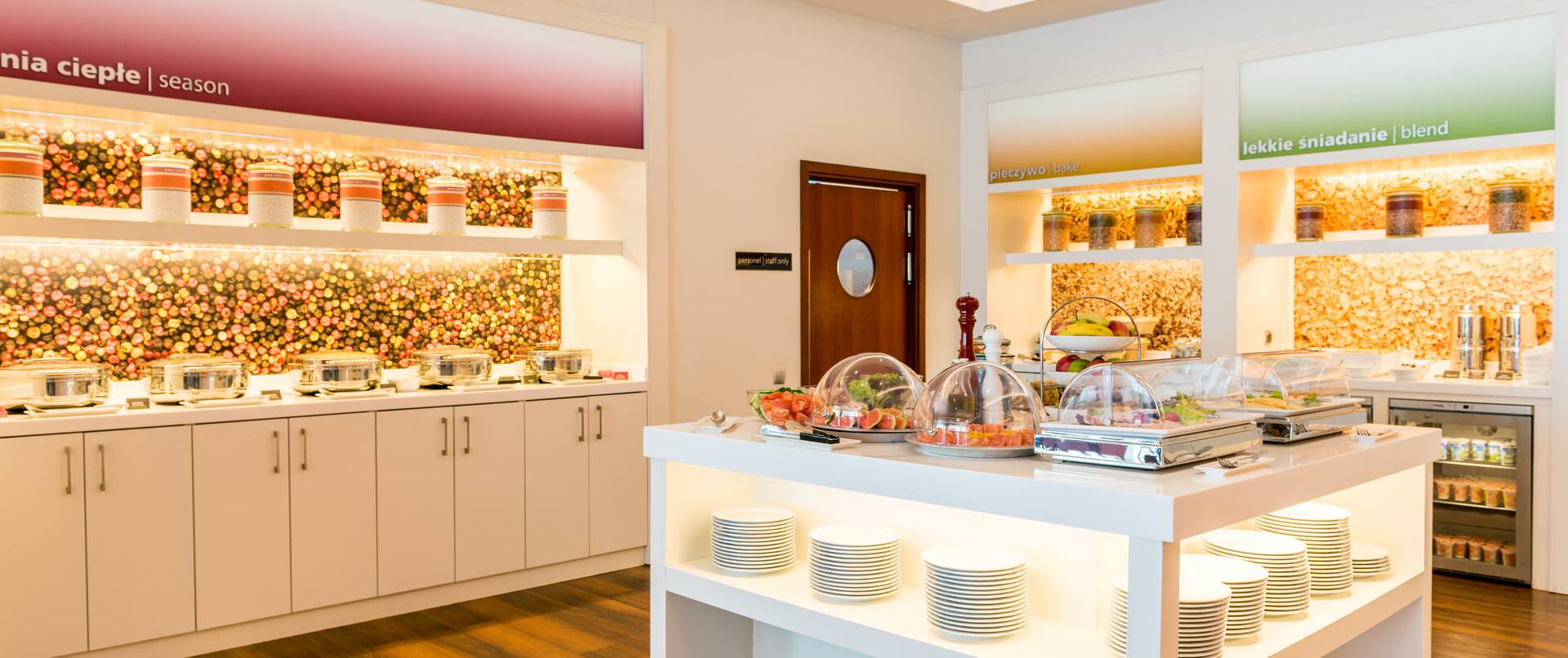 Hampton by Hilton Warsaw Airport Hotel, Poland - Bright Breakfast Room with Dishes on Counter