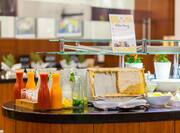 Breakfast bar with juices and honey 