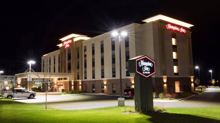 Hotel Building Exterior Parking Lot at Night