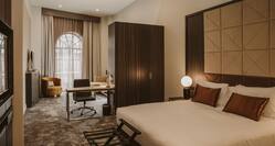 Large Bed and Work Desk in Suite