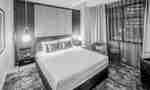 Large Bed and Seating Area in a Guest Room