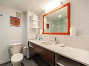 Bathroom with sink and mirror