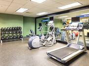 Fitness center with exercise bike, treadmill and free weights
