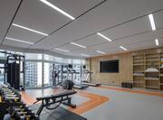 Spin2Cycle fitness room with free weights and treadmills