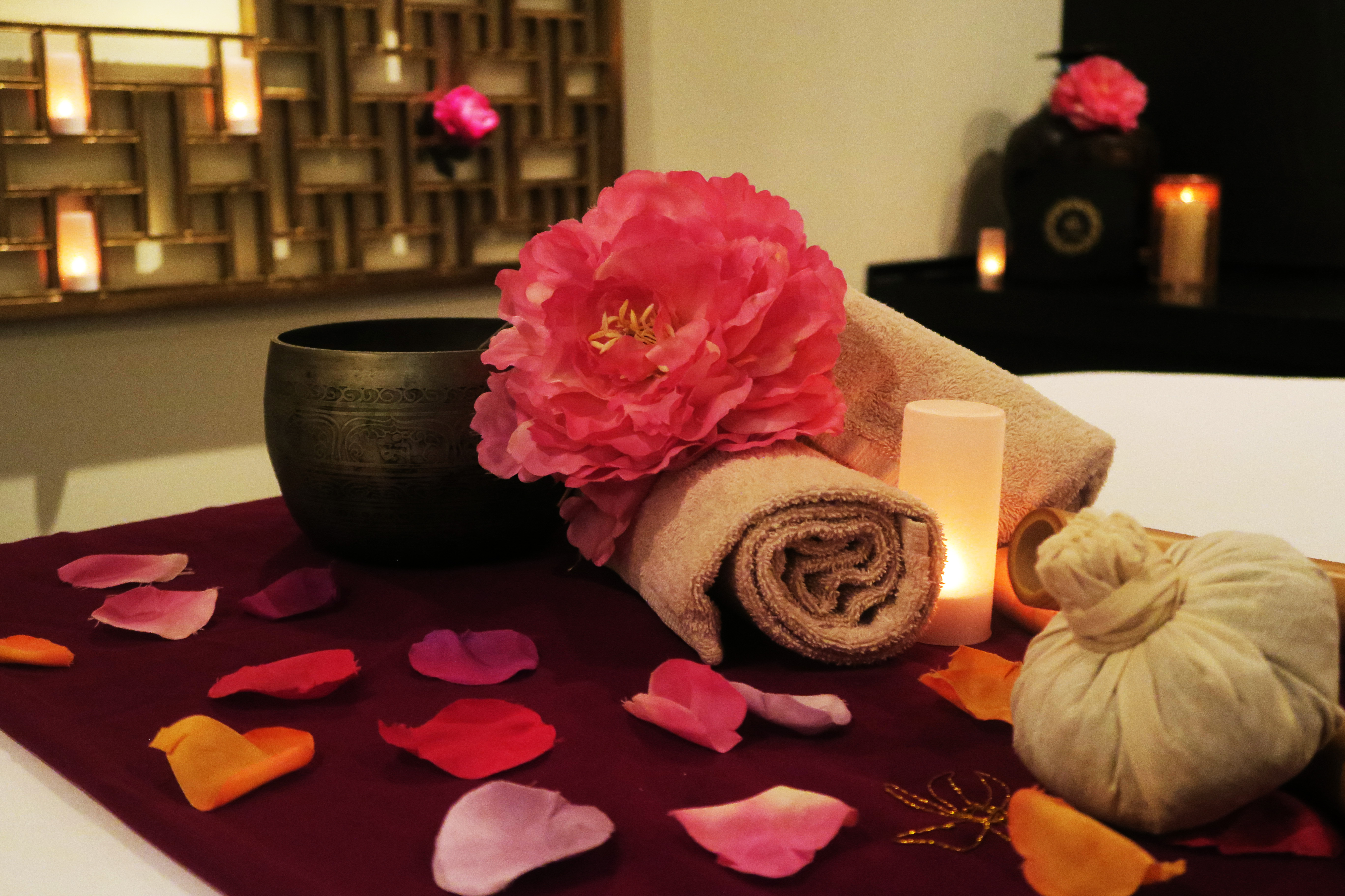 Flower Petals and Candle in Spa Treatment Room