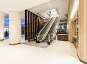 View of Escalators in Lobby Area of Hilton Hotel
