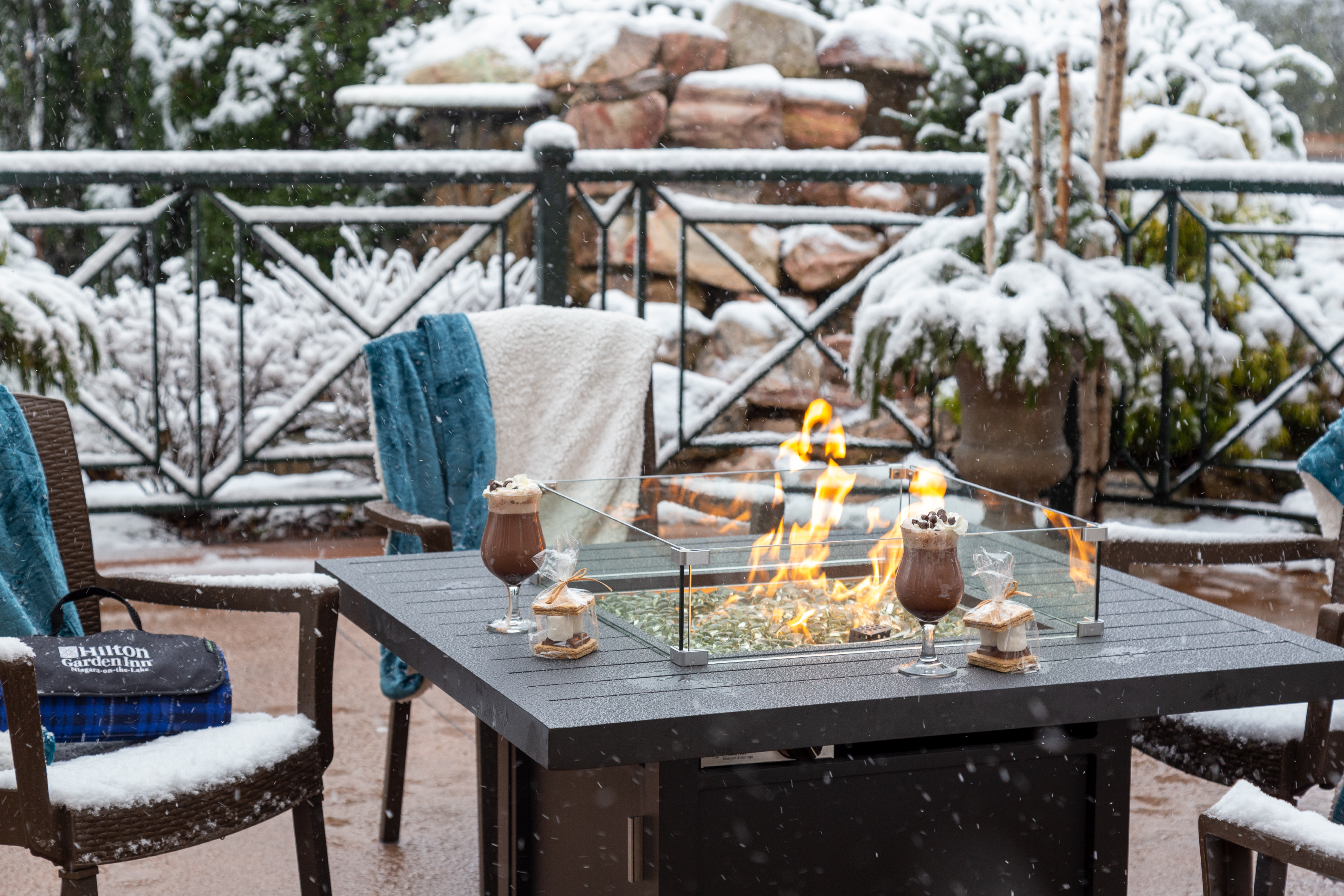 Outdoor Firepit with Drinks and Snow