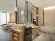 Bathroom with tub, mirror and sink