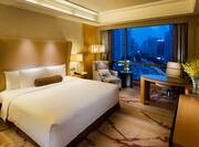 King Accessible Guest Room with City View by Night