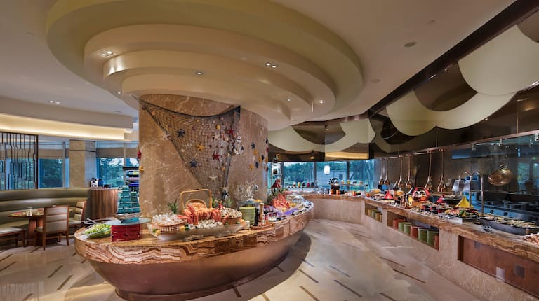  Circle Themes Buffet Restaurant buffet area with various food and beverage options