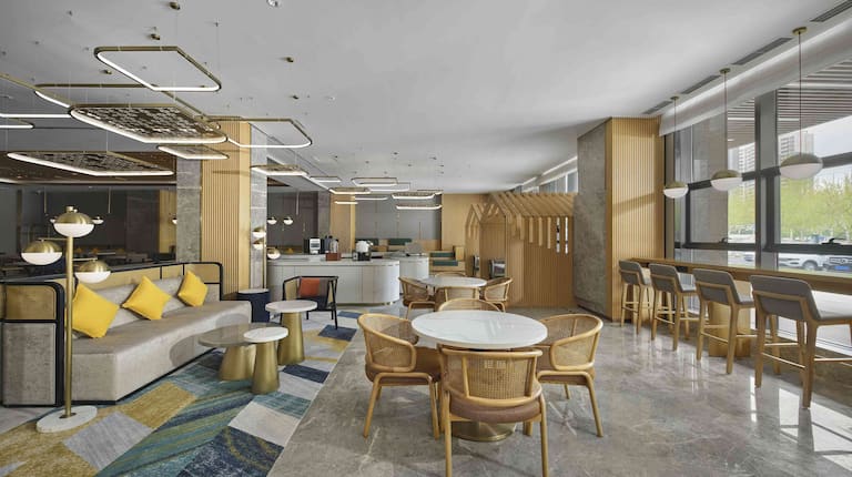 Lobby seating area with sofa and chairs