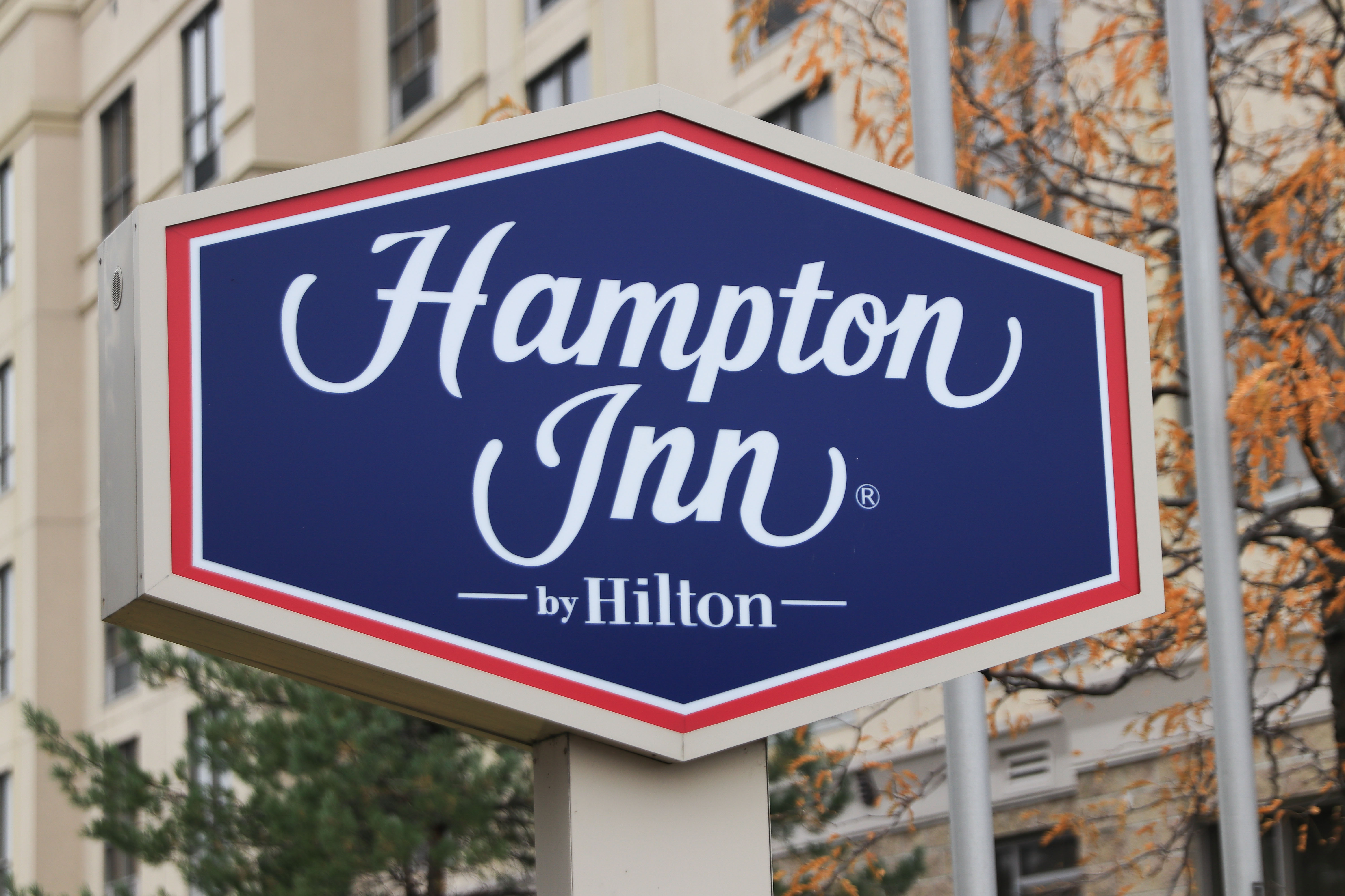Close-Up of Hampton Inn by Hilton Sign