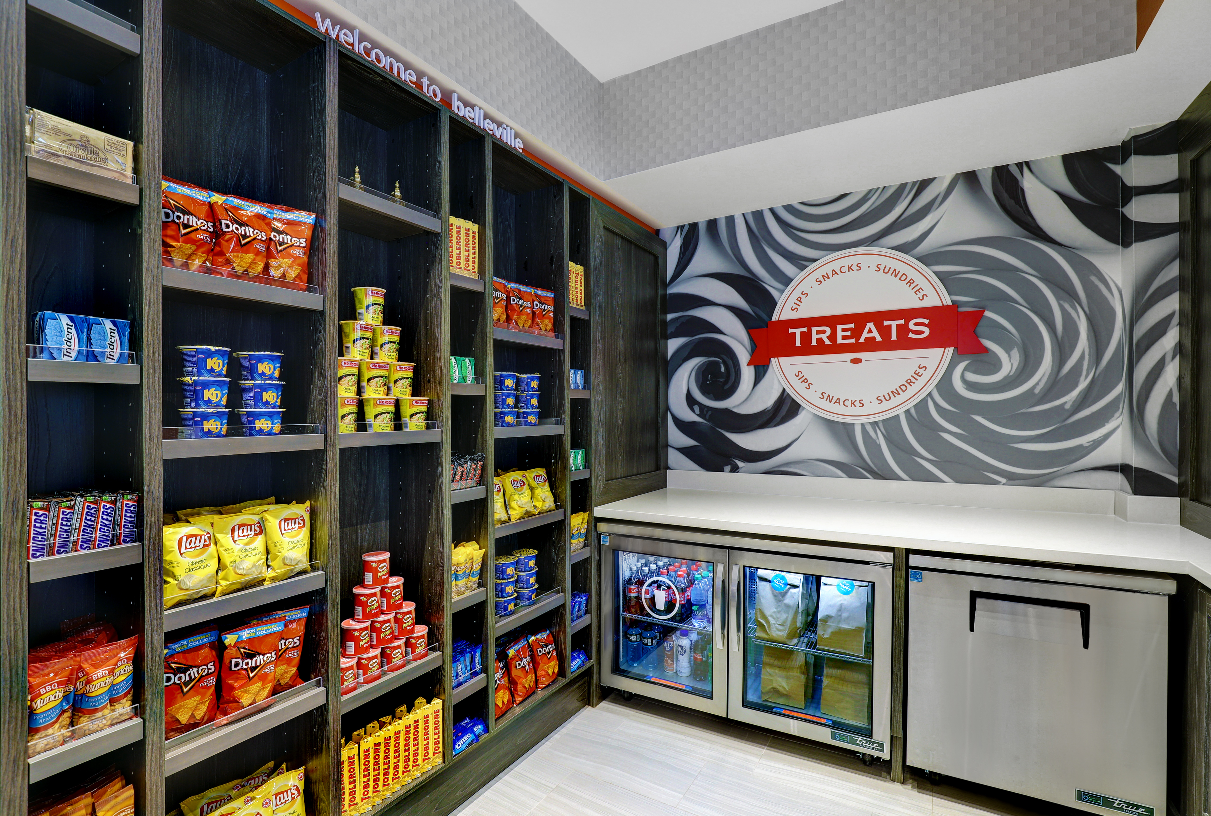 snack shop with various snacks and cold drinks