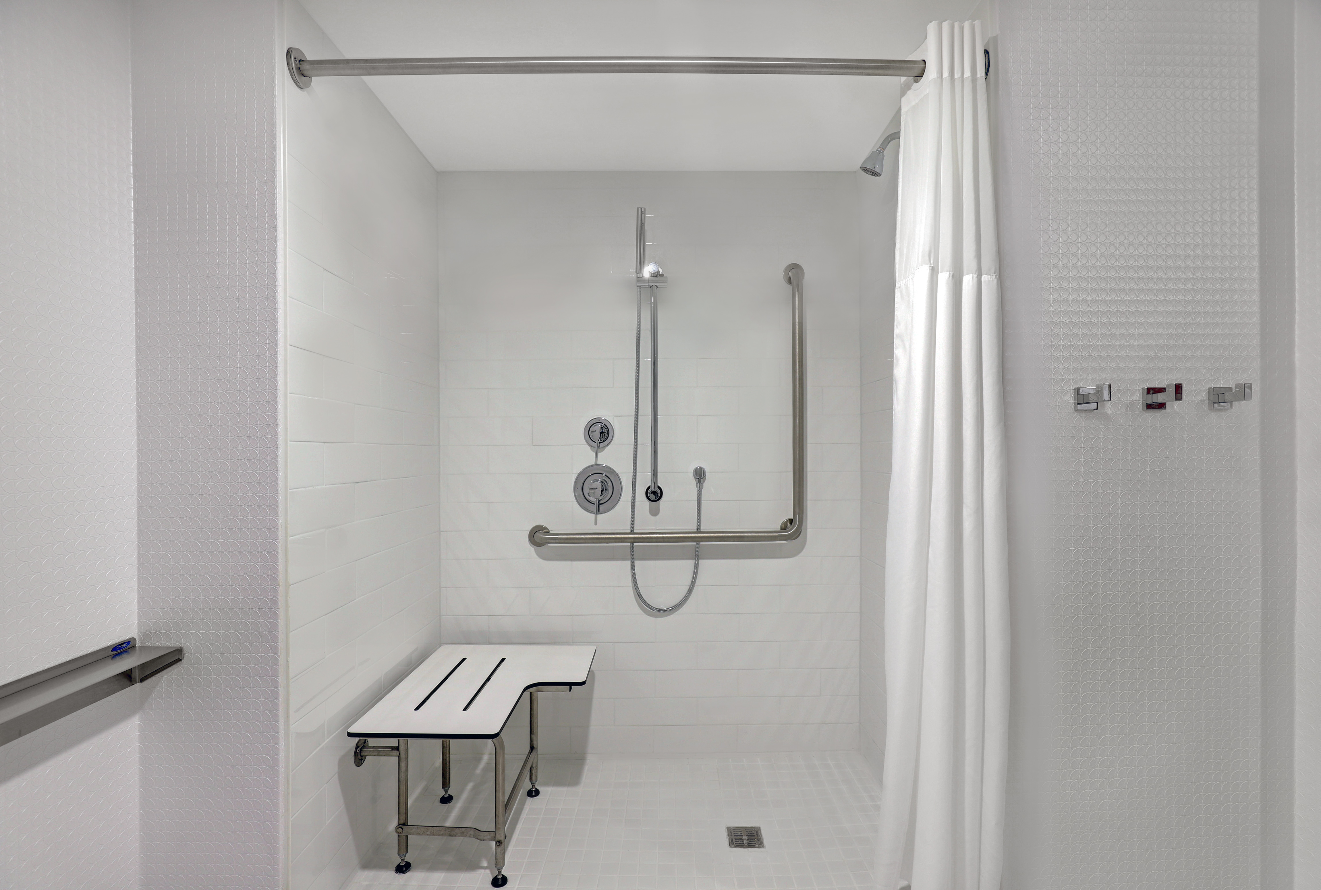 guest bathroom with accessible shower