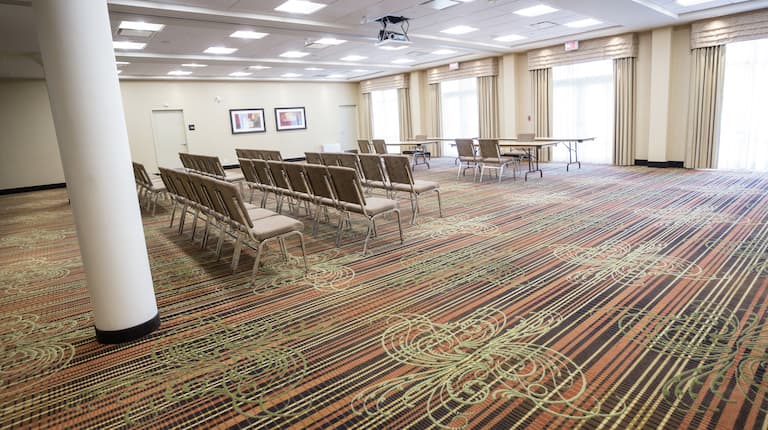 Large meeting room with floor to ceiling windows