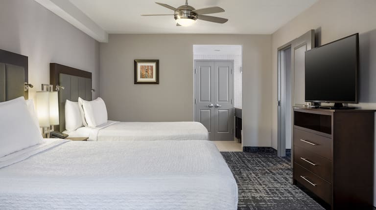 Bedroom with a Television