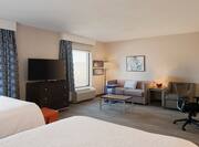 Studio Suite with Two Queen Beds, Work Desk, Lounge Seating and Television
