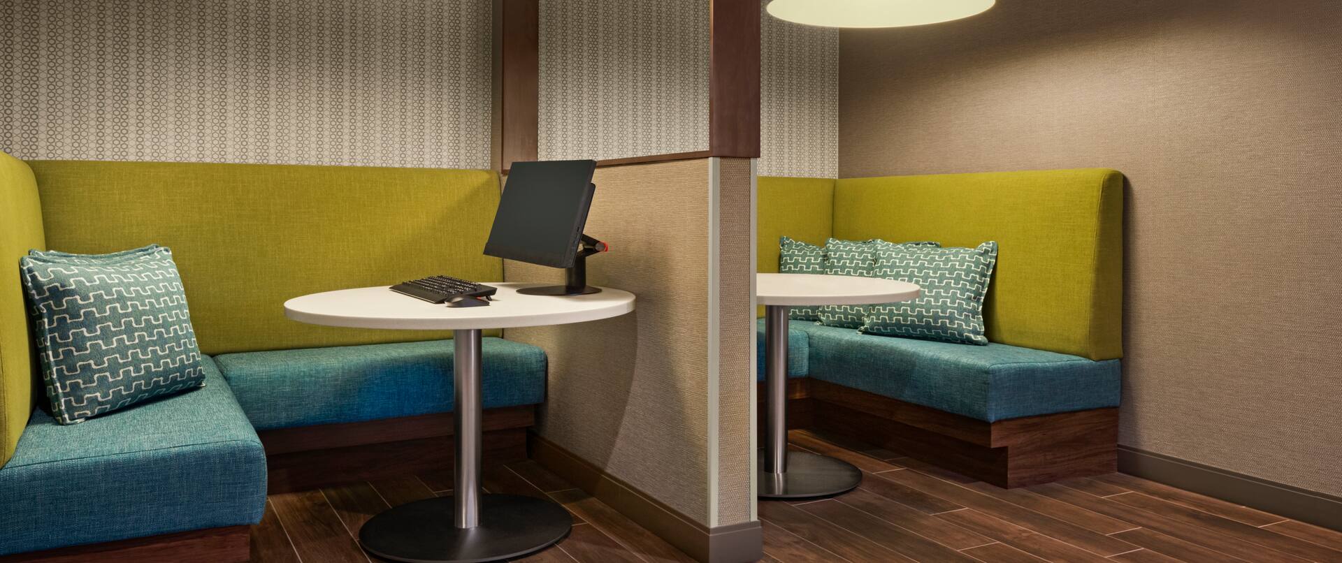 Business center with comfortable seating and computer
