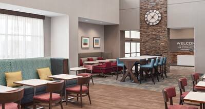 Lobby area with tables and chairs