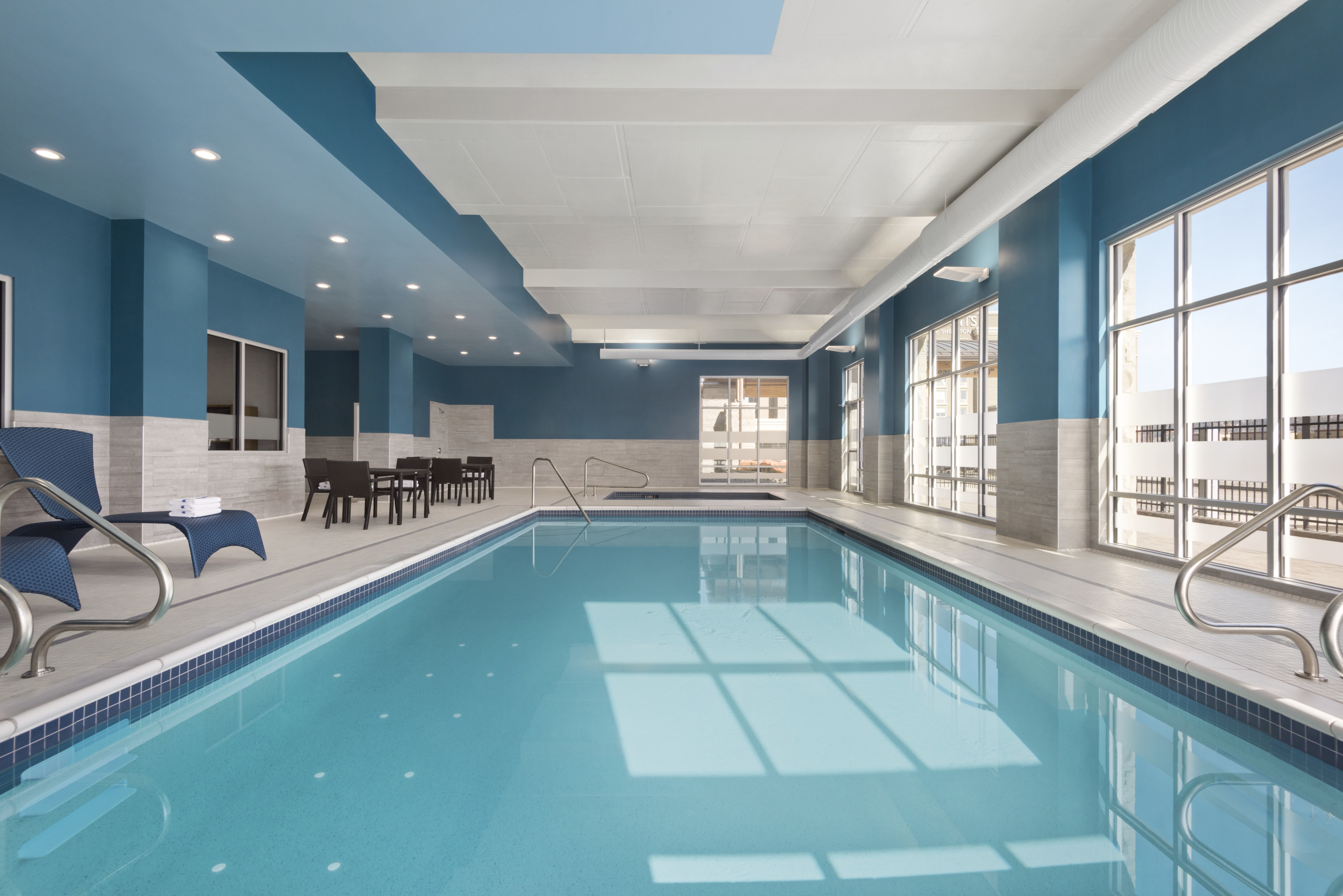 Indoor pool with loungers