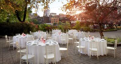 an outdoor wedding reception seating area