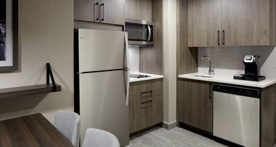 Guestroom Kitchen with Fridge and Microwave