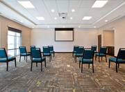 meeting room with seating and projector