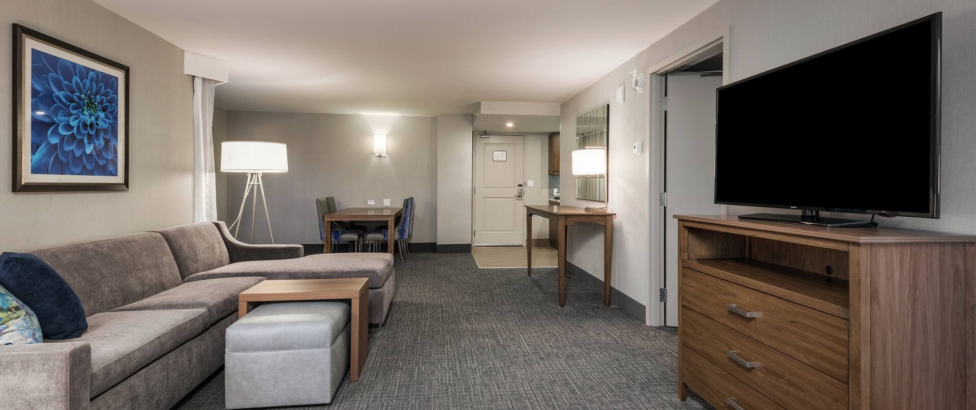 King Suite with Lounge Area, Dining Area, and Room Technology