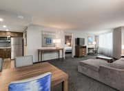 King Suite with Bed, Work Desk, Dining Area, Lounge Area, Kitchen, and Room Technology