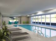 Indoor swimming pool nearby sun loungers