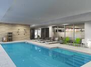 Indoor pool area with seating