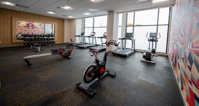 Fitness Center with Weights Exercise Bikes and Treadmills