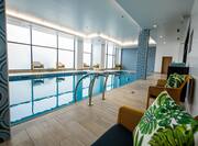 Indoor Swimming Pool with Seating Area