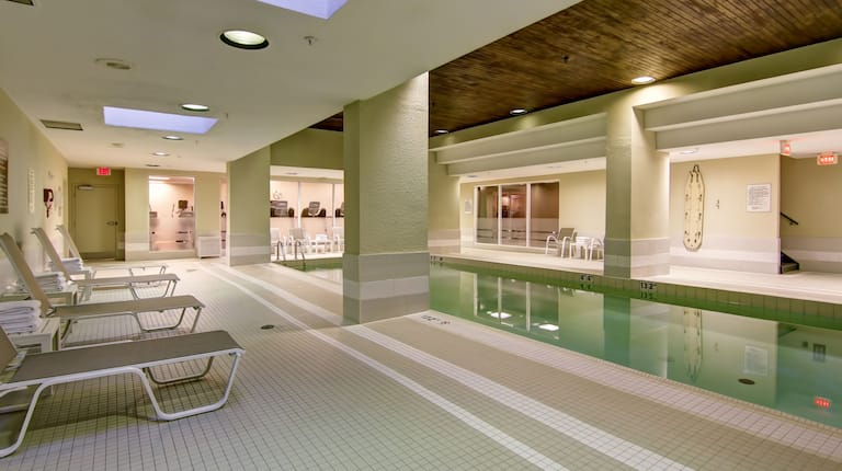 Indoor Swimming Pool with Deck Chairs
