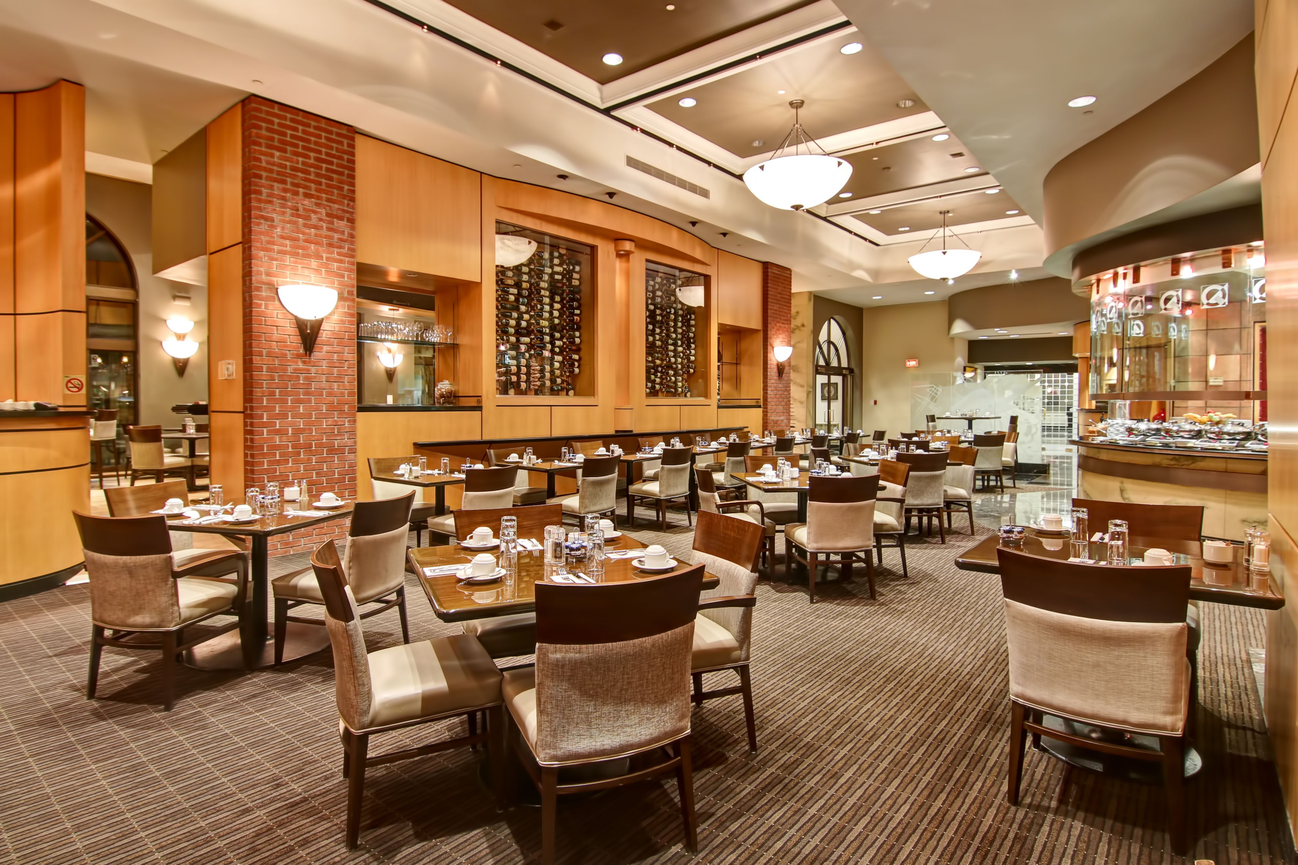 Spacious Restaurant Dining Area with Seats and Tables