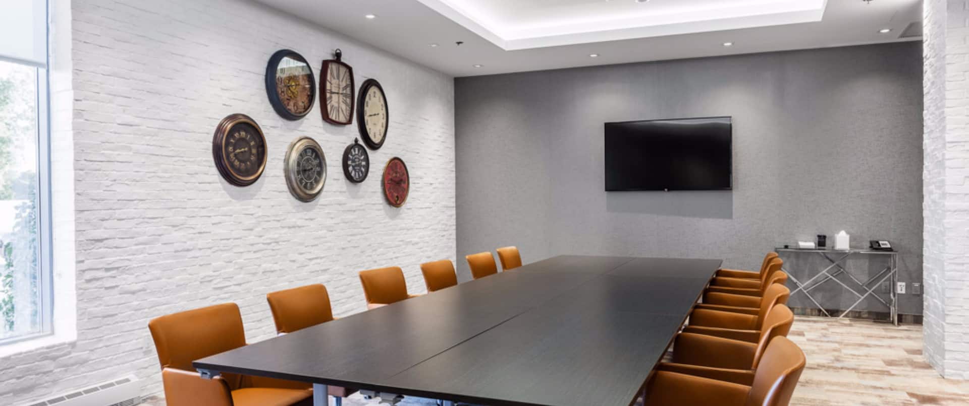 Boardroom Meeting Table, Office Chairs and Wall Mounted HDTV