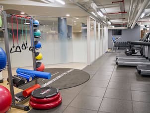 Fitness Center with Treadmills and Strength Training Equipment
