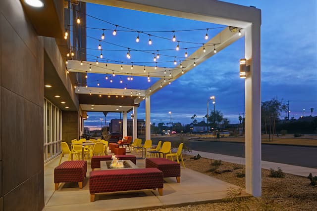 exterior patio with firepit at dusk