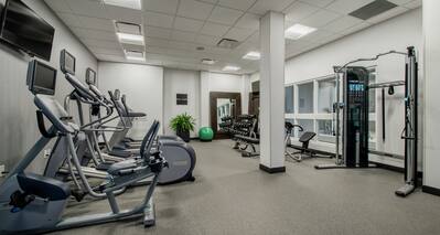 Fitness Center with Treadmills, Ellipticals, and Weights
