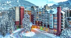 A wintry exterior shot of Hilton Whistler Resort & Spa