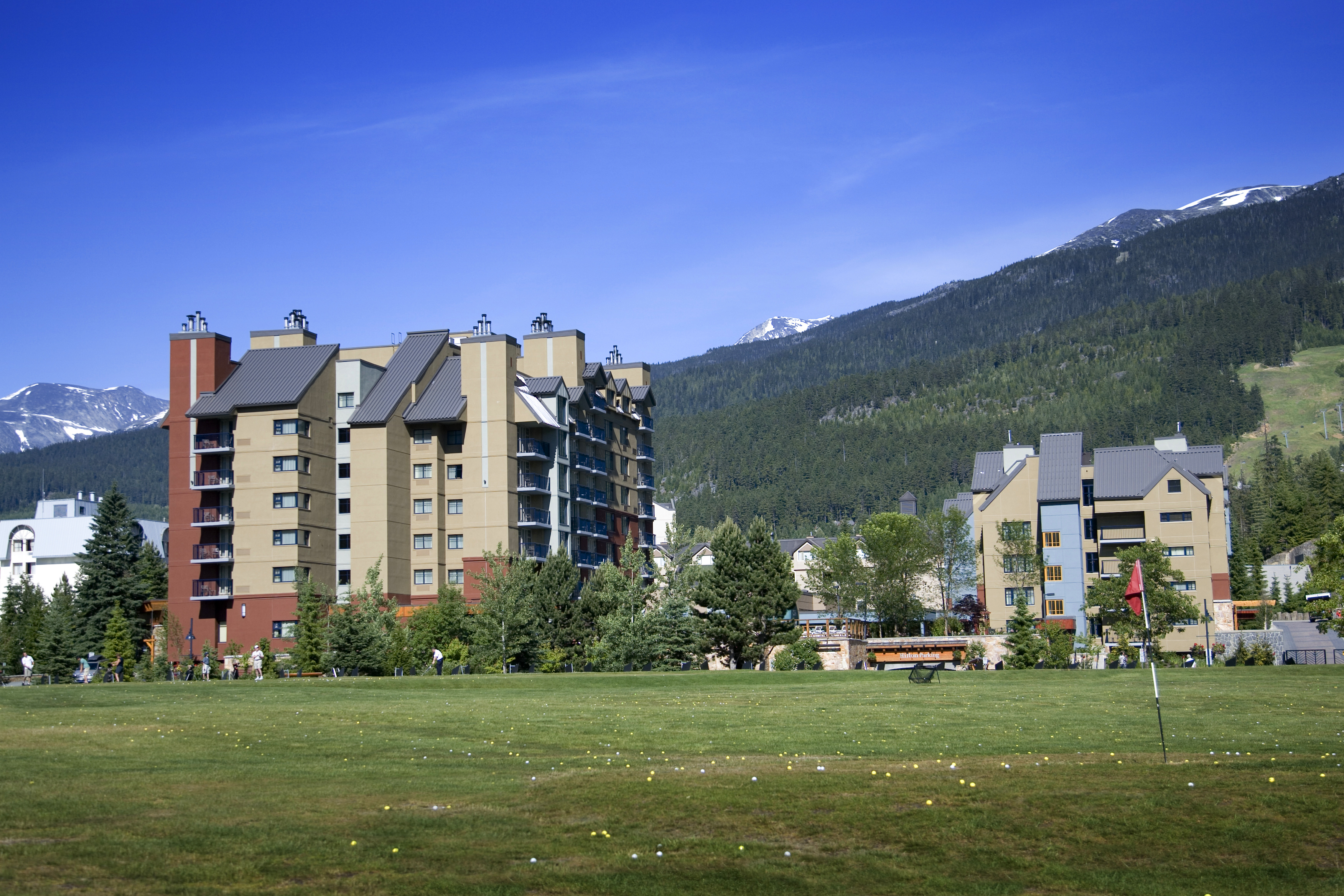 Golf Course and Mountainside View of Hotel