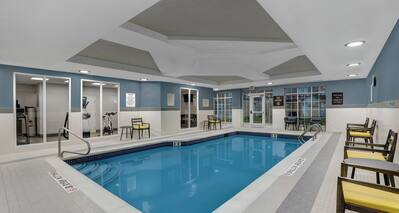 indoor pool with seating