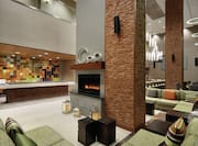 Lobby and Lounge Area with Cozy Sofas and Fireplace 