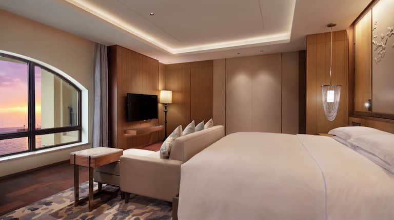 Presidential Suite with Bed, Lounge Area, Outside View, and Room Technology